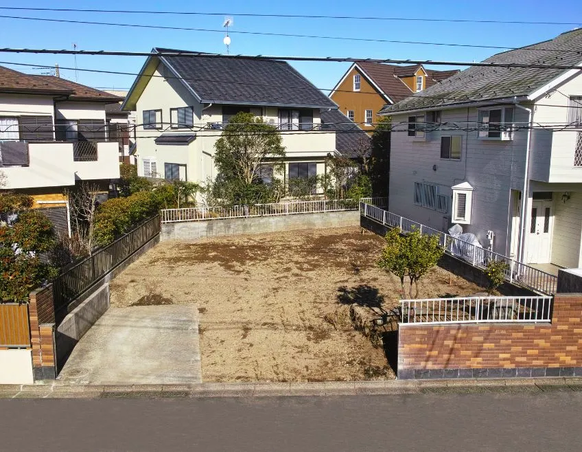 Professional land clearing and debris removal services for a residential lot in Dallas, preparing the site for new construction.